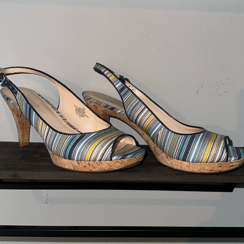 Cute Nine West multi stripe, 3 “ cork heel with open toe.Sz 7 1/2. Never worn.